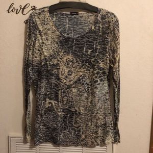 Thin Blouse. Stretchy material. Very comfortable.